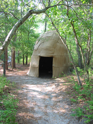 a replica of a traditional native american shelter