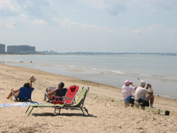people on the beach at First Landing State Park